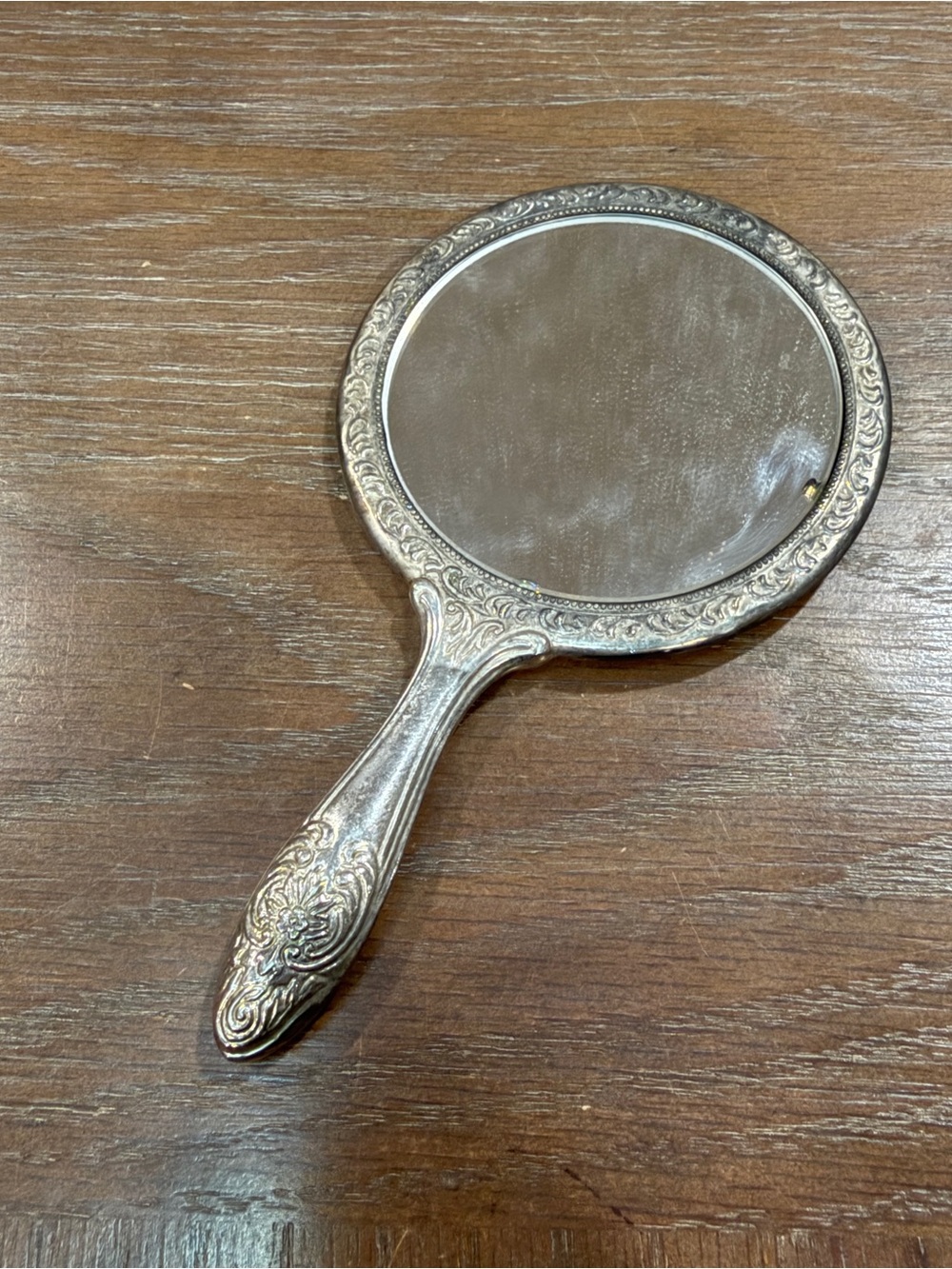 Antique embossed small silver tone vanity hand mirror